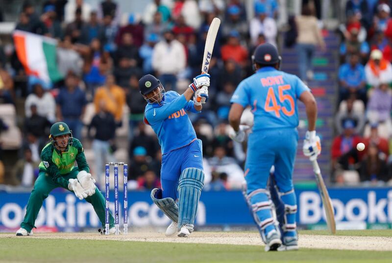MS Dhoni (8/10): The wicketkeeper-batsman came up the order to bat at No 5 with nearly 100 runs still to get. He formed a good partnership with Rohit, scoring 34 off 46 balls. By the time he got out, India were nearly home. Dhoni was solid behind the stumps, as usual. A rare fumble early in South Africa's innings even proved fortuitous as Amla came on strike to get out next ball. Alastair Grant / AP Photo