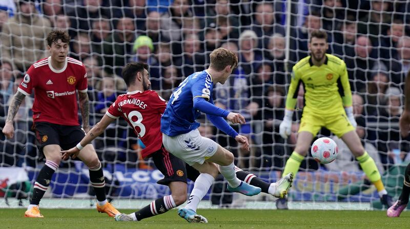 Anthony Gordon scores the opening goal. EPA