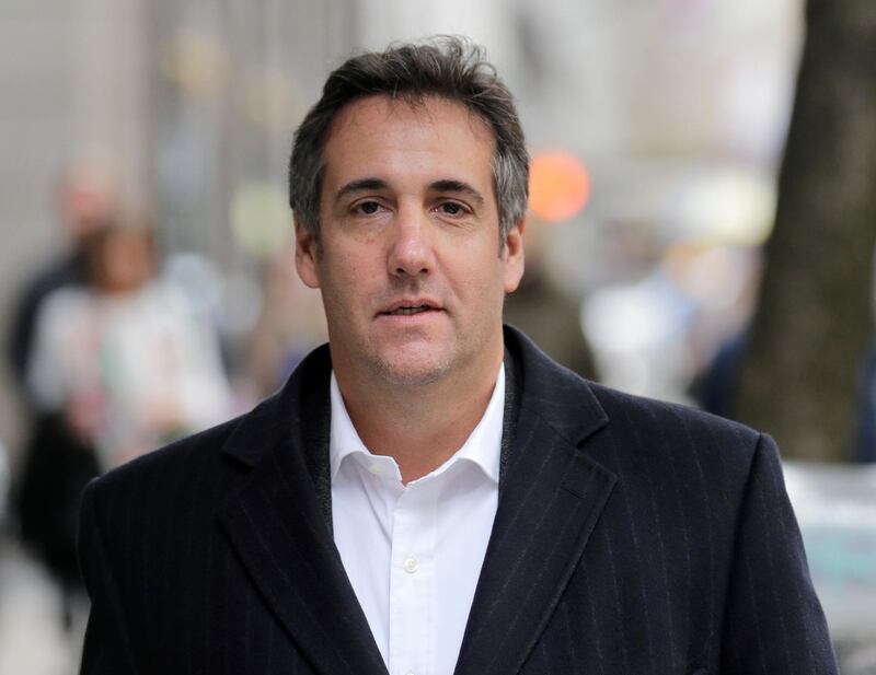 Michael Cohen, President Donald Trump's personal attorney, walks down the sidewalk in New York, Wednesday, April 11, 2018. Federal agents on Monday raided the offices of Cohen, who has been under intense public scrutiny for weeks over a $130,000 payment to a porn actress who says she had sex with Trump more than a decade ago. (AP Photo/Seth Wenig)