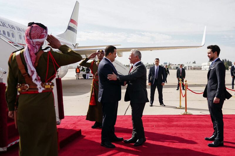 King Abdullah and Crown Prince Al Hussein welcoming Mr Al Sudani to Amman. AFP