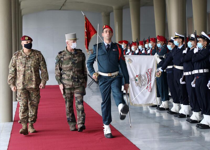 Lebanon's Army Commander General Joseph Aoun and French Armies Chief of Staff General Francois Lecointre reviewing an honor guard at the Lebanese Army headquarters in Yarze, east of Beirut. AFP