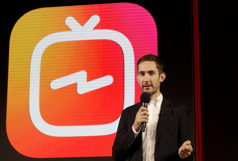 FILE - In this Tuesday, June 19, 2018, file photo, Kevin Systrom, CEO and co-founder of Instagram, prepares for an announcement about IGTV in San Francisco. In a statement late Monday, Sept. 24, 2018, Systrom said in a statement that he and Mike Krieger, Instagramâ€™s chief technical officer, plan to leave the company in the next few weeks and take time off â€œto explore our curiosity and creativity again.â€ (AP Photo/Jeff Chiu, File)