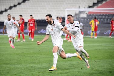 Al Jazira’s Serbian centre-back Milos Kosanovic celebrates after scoring a late equaliser against Shabab Al Ahli in the Arabian Gulf League at the Mohamed bin Zayed stadium on Saturday, March 6, 2021. Courtesy PLC