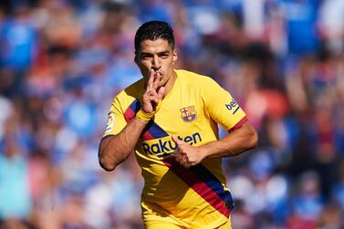 Luis Suarez of FC Barcelona celebrates after scoring Barcelona's opening goal against Getafe on Saturday. Getty