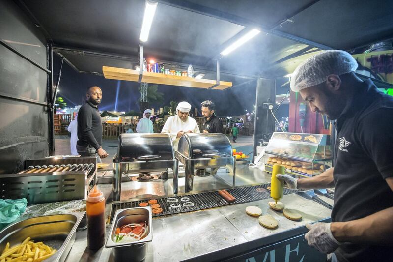 AL WATHBA, UNITED ARAB EMIRATES- Burgers available at Sheikh Zayed Heritage.  Leslie Pableo for The National