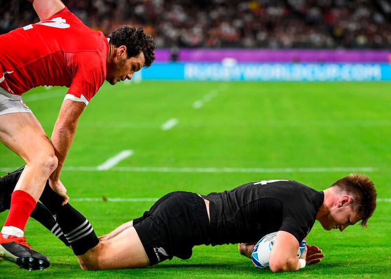 New Zealand's wing Jordie Barrett scores All Blacks second try during the Japan 2019 Rugby World Cup Pool B match between New Zealand and Canada at the Oita Stadium in Oita. AFP