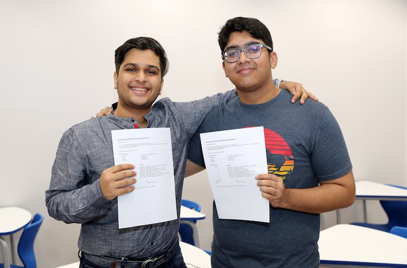 Jay Sunil Goenka, left, and Sumanyu Tonapi are happy after receiving their IB results at Gems Modern Academy.