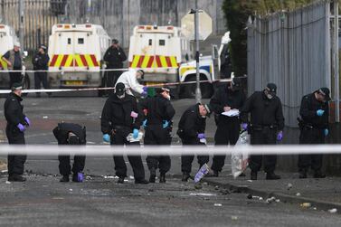 Police inspect the scene where journalist Lyra McKee was shot dead in Londonderry, Northern Ireland. Reuters