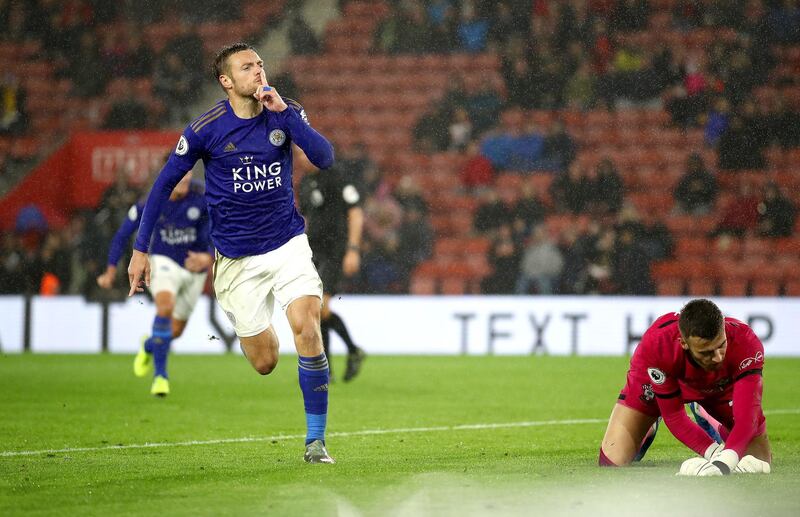 SOUTHAMPTON, ENGLAND - OCTOBER 25: Jamie Vardy of Leicester City celebrates after scoring his team's ninth goal from the penalty spot as Angus Gunn of Southampton reacts during the Premier League match between Southampton FC and Leicester City at St Mary's Stadium on October 25, 2019 in Southampton, United Kingdom. (Photo by Bryn Lennon/Getty Images)