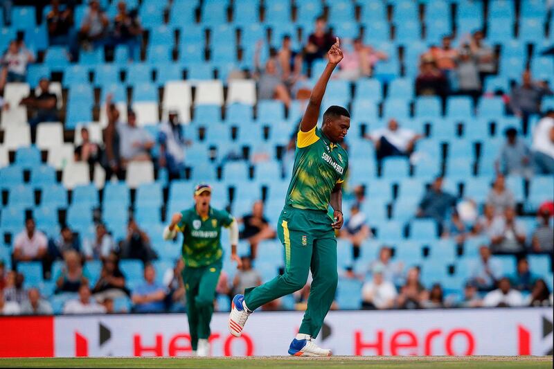 South Africa bowler Lungi Ngidi celebrates the dismissal of India batsman Rohit Sharma during the sixth One Day International cricket match between South Africa and India at the Super Sport Park in Centurion on February 16, 2018. / AFP PHOTO / MARCO LONGARI