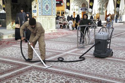 The thick Persian carpets covering the courtyard are vacuumed every few hours to keep them pristine. Leila Molana-Allen for The National