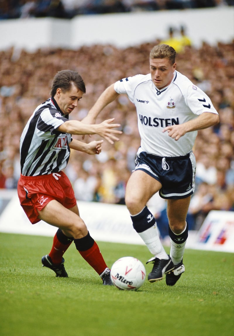 LONDON, UNITED KINGDOM - SEPTEMBER 08:  Paul Gascoigne of Spurs is challenged by Mel Sage of Derby during a League Division One match between Tottenham Hotspur and Derby County at White Hart Lane on September 8, 1990 in London, England.  (Photo by Gary M. Prior/Allsport/Getty Images)