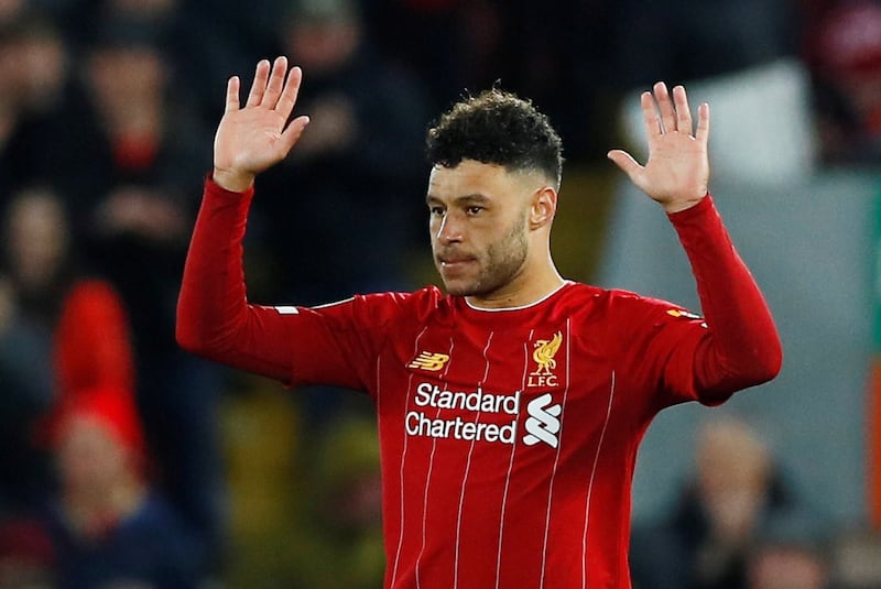 Soccer Football - Carabao Cup - Fourth Round - Liverpool v Arsenal - Anfield, Liverpool, Britain - October 30, 2019  Liverpool's Alex Oxlade-Chamberlain celebrates scoring their third goal  Action Images via Reuters/Jason Cairnduff  EDITORIAL USE ONLY. No use with unauthorized audio, video, data, fixture lists, club/league logos or "live" services. Online in-match use limited to 75 images, no video emulation. No use in betting, games or single club/league/player publications.  Please contact your account representative for further details.