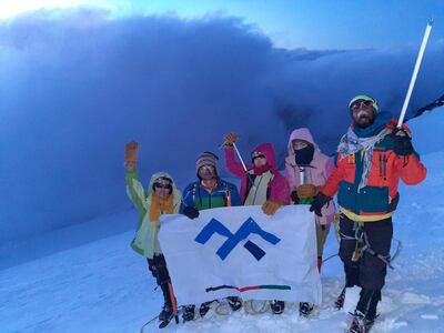 Zabih Afzali and his friends celebrating their summit of Noshakh in 2020. Courtesy Zabih Afzali