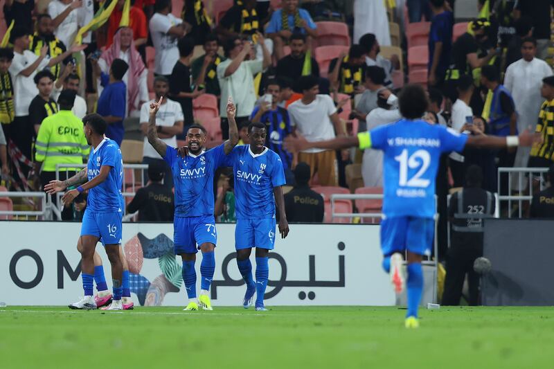 Malcom celebrates with teammates after scoring Al Hilal's second goal against Al Ittihad. Getty Images