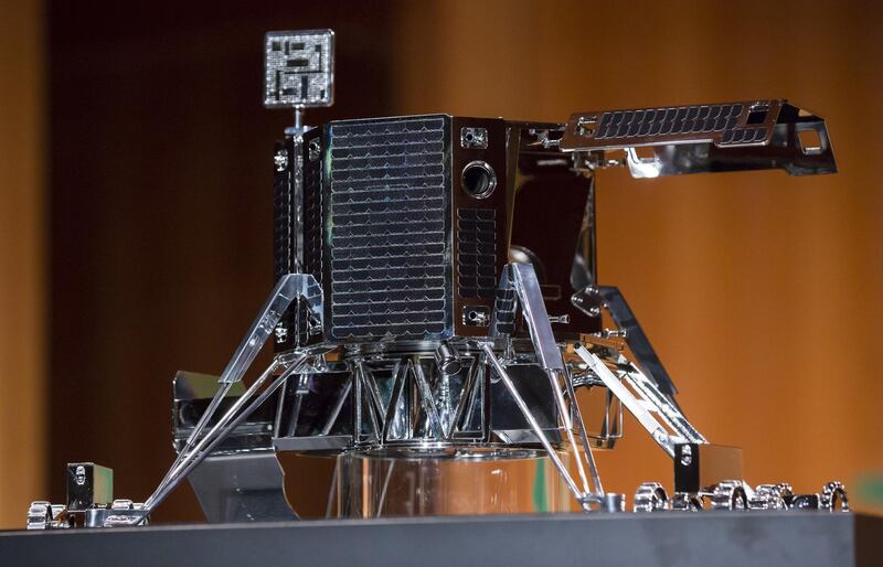 A concept model of Ispace Inc.'s new lander is displayed during a news conference in Tokyo, Japan, on Wednesday, Dec. 13, 2017. Tokyo-based Ispace said it raised 10.2 billion yen ($90 million) from some of the country’s biggest businesses, including Japan Airlines Co. and television network Tokyo Broadcasting System Holdings Inc. The funds will be used to send a spacecraft into lunar orbit by 2019, and then land one a year later. Photographer: Tomohiro Ohsumi/Bloomberg