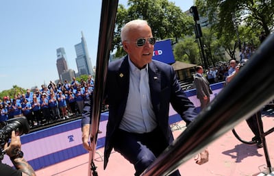 FILE PHOTO: U.S. Democratic presidential candidate and former Vice President Joe Biden runs up the steps onto the stage to begin the kickoff rally of his campaign for the 2020 Democratic presidental nomination in Philadelphia, Pennsylvania, U.S., May 18, 2019. REUTERS/Jonathan Ernst/File Photo