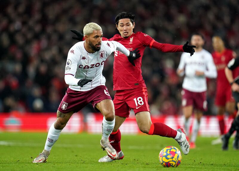 Takumi Minamino - 6: The Japanese was given two minutes on the pitch in place of Mane. There was barely any time for him to make an impact. PA