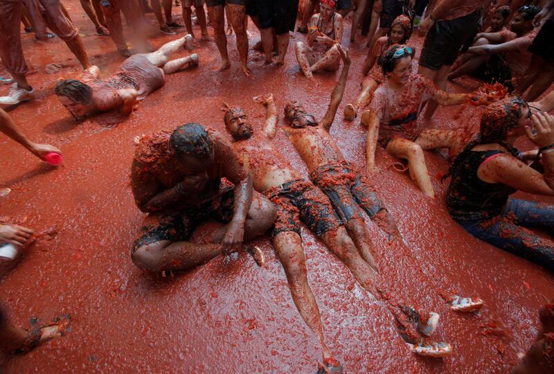 The streets run with tomato pulp. Reuters