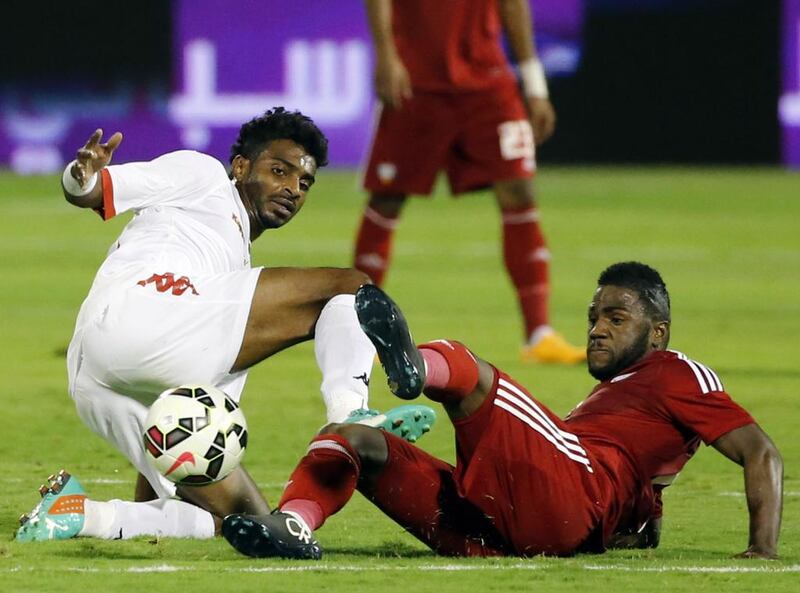 The UAE’s Ismail Hamadi and Oman’s Ahmed Al-Mukhime  during their 0-0 Gulf Cup draw in Riyadh. AFP