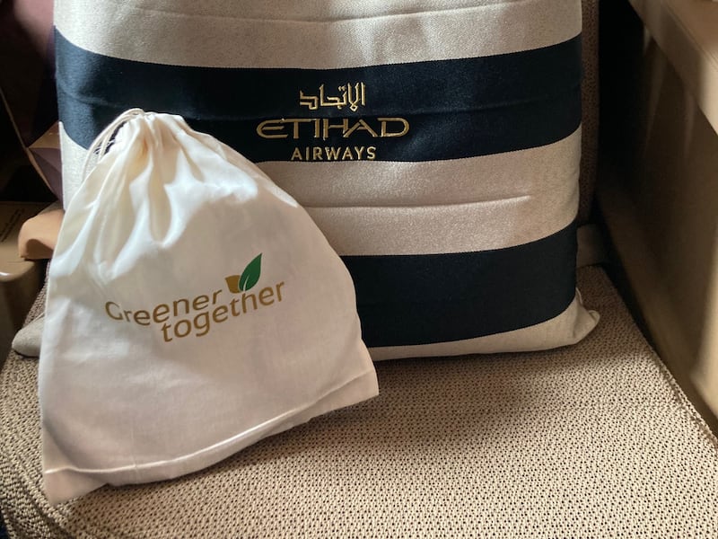 Upcycled tote bags and cotton bags replaced plastic bags on the eco-flight