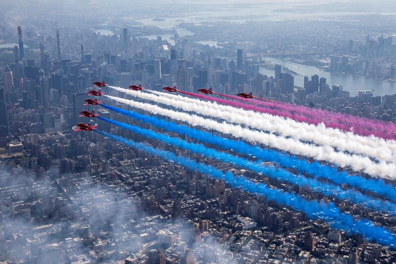 Britain's Royal Air Force aerobatic team the Red Arrows fly over New York City, U.S.  Reuters