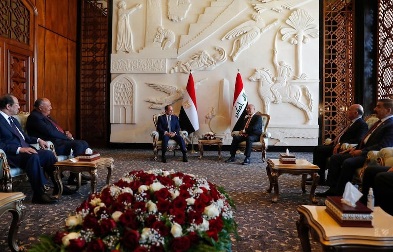 Iraqi President Barham Salih receives his Egyptian counterpart, Abdel Fattah El-Sisi at Baghdad Airport. AFP