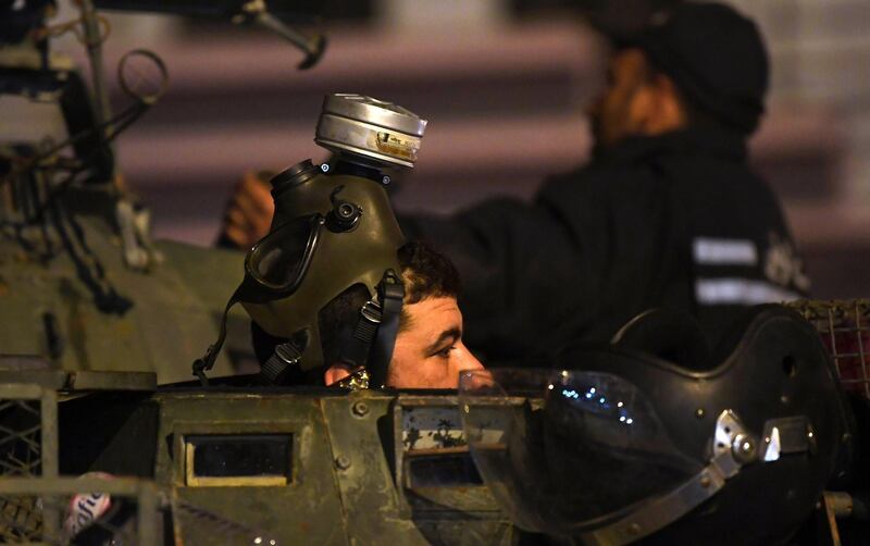More than 200 people have been arrested and dozens of police hurt during clashes in Tunisia. Fethi Belaid / AFP Photo