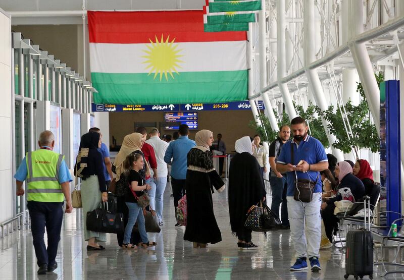 Passengers are seen at Arbil airport, in the capital of Iraq's autonomous northern Kurdish region, on September 28, 2017.
All foreign flights to and from the Iraqi Kurdish capital Arbil will be suspended from Friday, officials said, as Baghdad increases pressure on the Kurds over this week's independence referendum. / AFP PHOTO / SAFIN HAMED