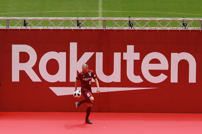 Andres Iniesta juggles the ball during his unveiling as a Vissel Kobe player. Buddhika Weerasinghe / Getty Images