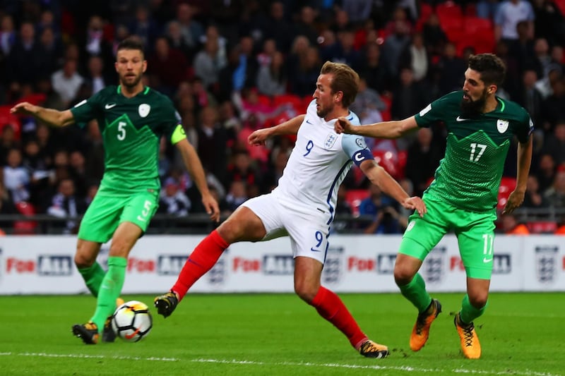 LONDON, ENGLAND - OCTOBER 05:  Harry Kane of England (9) scores their first goal during the FIFA 2018 World Cup  Group F Qualifier between England and Slovenia at Wembley Stadium on October 5, 2017 in London, England.  (Photo by Clive Rose/Getty Images)