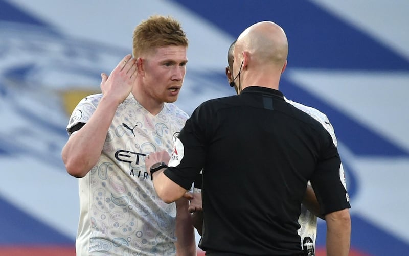 Kevin De Bruyne argues with referee Anthony Taylor during the English Premier League match against Leicester  on April 3. AP