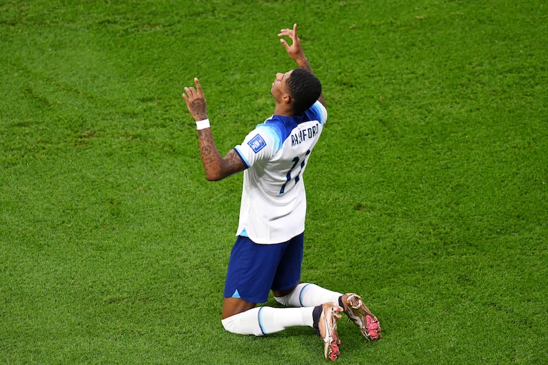 Marcus Rashford celebrates after scoring. Getty