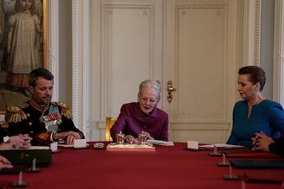 Denmark's Queen Margrethe signs a declaration of abdication in the Council of State at Christiansborg Castle, after a reign of 52 years. Reuters