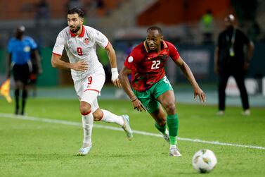 Soccer Football - Africa Cup of Nations - Group E - Tunisia v Namibia - Stade Amadou Gon Coulibaly, Korhogo, Ivory Coast - January 16, 2024  Namibia's Ryan Nyambe in action with Tunisia's Haythem Jouini REUTERS / Luc Gnago