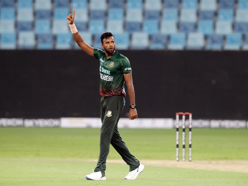 Bangladesh bowler Ebadot Hossain celebrates after taking the wicket of UAE's Basil Hameed.