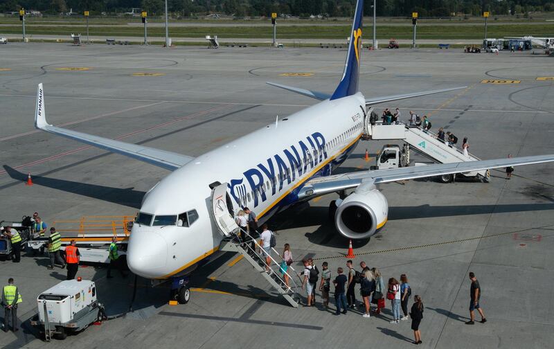 epa07719818 (FILE) - The passengers of the first flight Kiev - Berlin of the low coast airline Ryanair board the plane in Kiev's airport Boryspil, Ukraine, 03 September 2018, reissued 16 July 2019. Media reports state that Ryanair will be forced to cut the number of summer flights it operates nin 2020 as it predicted further delays before the Boeing 737 Max is allowed to fly again. Ryanair has 58 planes on order.  EPA/SERGEY DOLZHENKO *** Local Caption *** 54957356