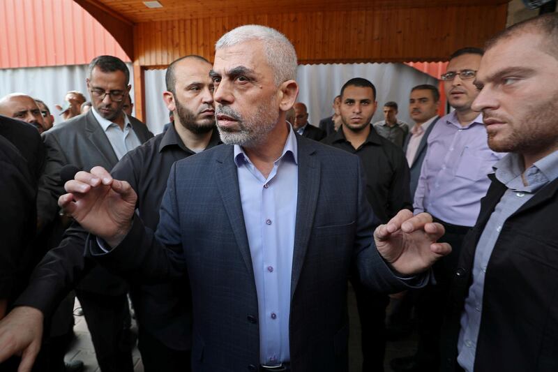 FILE PHOTO: Gaza's Hamas Chief Yehya Al-Sinwar talks to media before meeting with Chairman of the Palestinian Central Election Committee Hana Naser, in Gaza City October 28, 2019. REUTERS/Mohammed Salem/File Photo