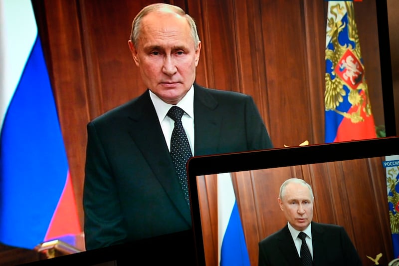 Russian President Vladimir Putin addresses the nation in Moscow on Saturday. AP