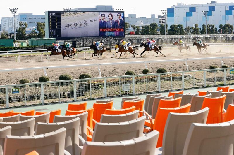A horse race is held without spectators amid growing concern about the spread of a new coronavirus, in Tokyo on Thursday, February 27. AP