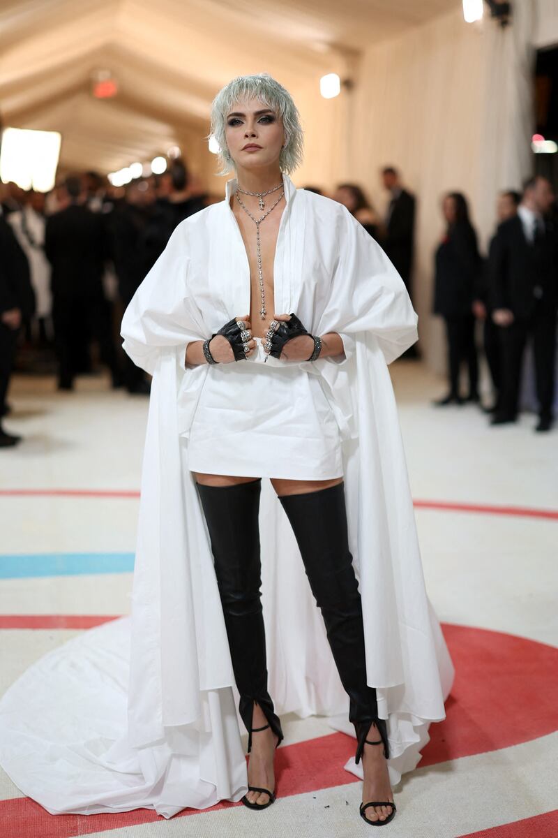 Cara Delevingne pays homage to Lagerfeld with her hairdo. AFP