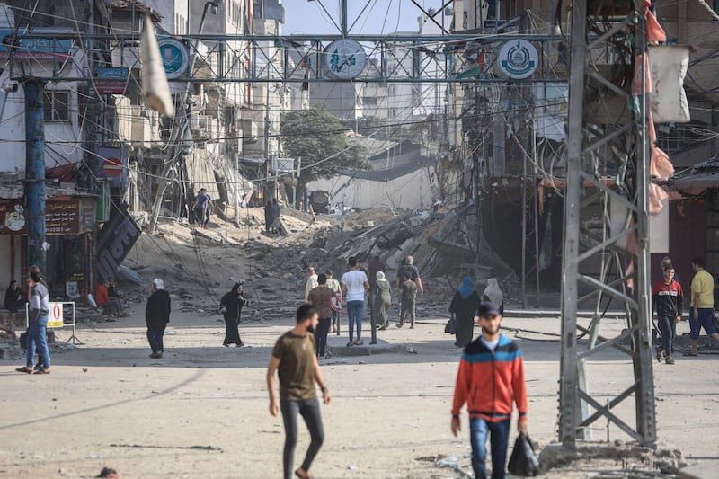 The rubble from destroyed residential buildings fills a street in Gaza city. Bloomberg