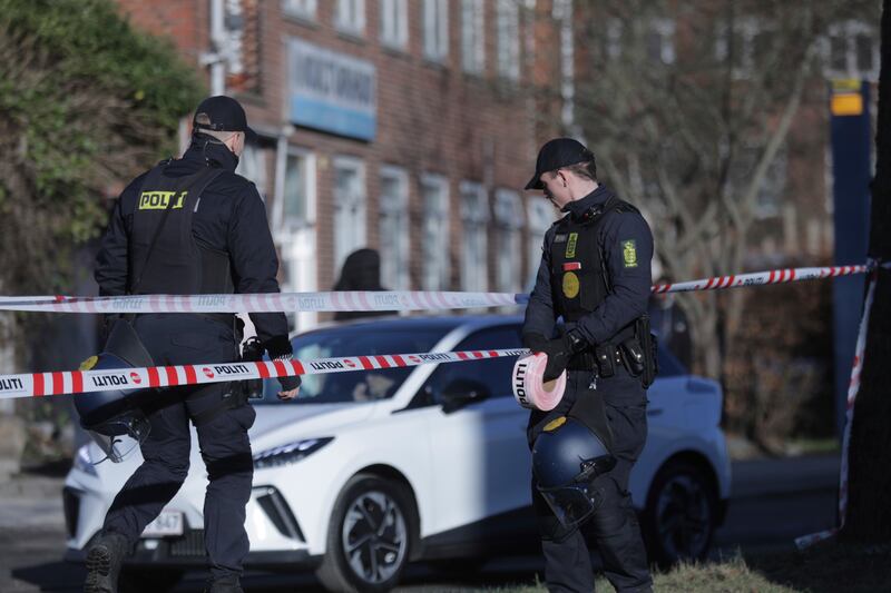 Police cordon off an area in front of a mosque in the Noerrebro area of Copenhagen. AP
