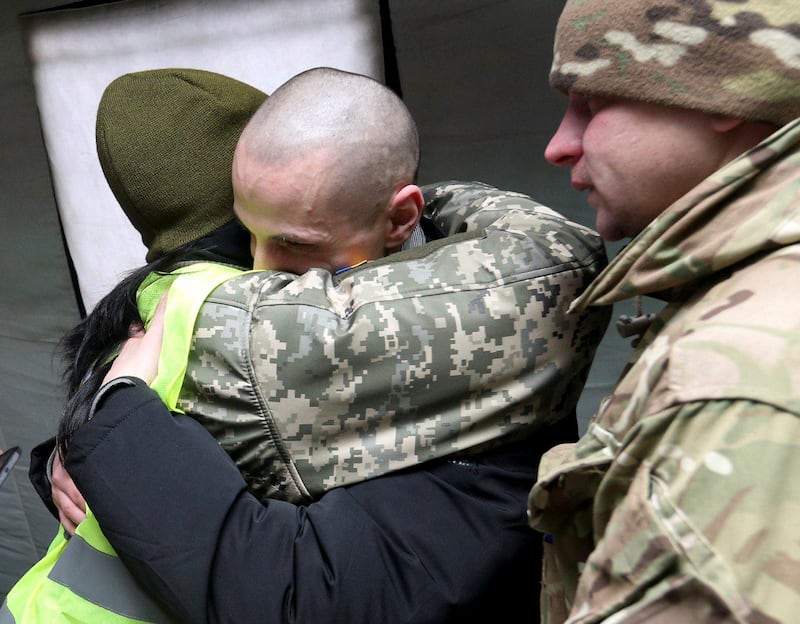 A Ukrainian citizen is welcomed upon his arrival following the exchange of prisoners of war (POWs) between Ukraine and the separatist republics near the Mayorsk crossing point in Donetsk region, Ukraine December 29, 2019. Ukrainian Presidential Press Service/Handout via REUTERS ATTENTION EDITORS - THIS IMAGE WAS PROVIDED BY A THIRD PARTY.?