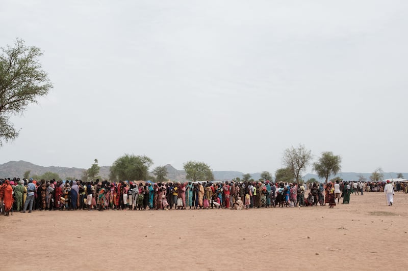 People queue to register for a potential food aid delivery in North Kordofan. Doctors Without Borders says there are 'extreme levels of suffering' across Sudan.