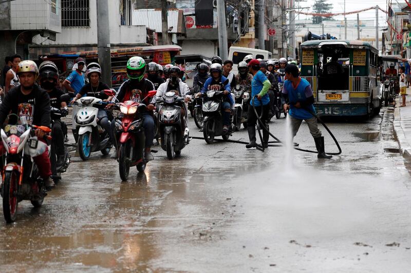 Filipino motorcycle riders offer much-needed support to residents of the flood-ravaged city of Marikina. EPA