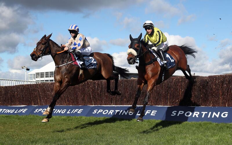 Allmankind ridden by jockey Harry Skelton (right) alongside Captain Guinness and Rachael Blackmore clear a fence during the Sporting Life Arkle Challenge Trophy Novices' Chase during day one of the Cheltenham Festival at Cheltenham Racecourse. Picture date: Tuesday March 16, 2021. PA Photo. See PA Story RACING Cheltenham. Photo credit should read: David Davies/PA Wire for the Jockey Club.

RESTRICTIONS: Editorial Use only, commercial use is subject to prior permission from The Jockey Club/Cheltenham Racecourse.