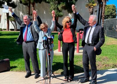 Judy Huth, second from right, with her lawyers after the announcement of the verdict. AP