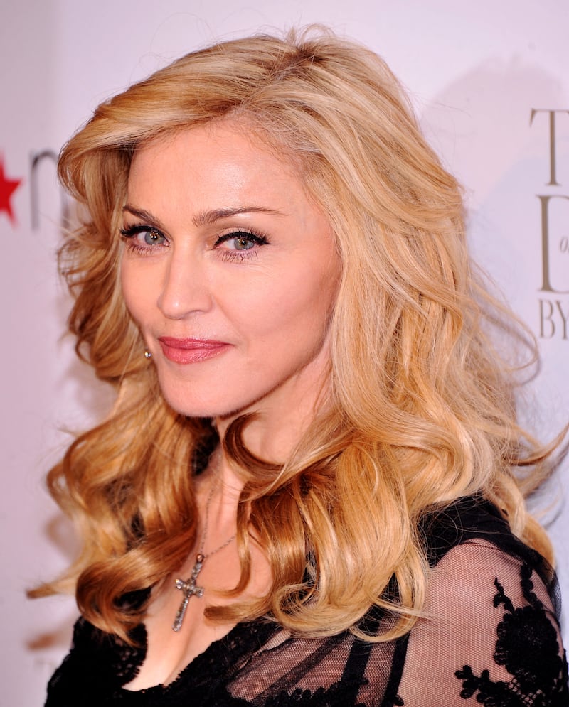 Madonna launches her signature fragrance Truth Or Dare in 2012. Getty / AFP