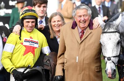 PA via Reuters
Jockey Harry Skelton (left), owner John Hales and horse Politologue after winning the Betway Queen Mother Champion Chase during day two of the Cheltenham Festival at Cheltenham Racecourse.
